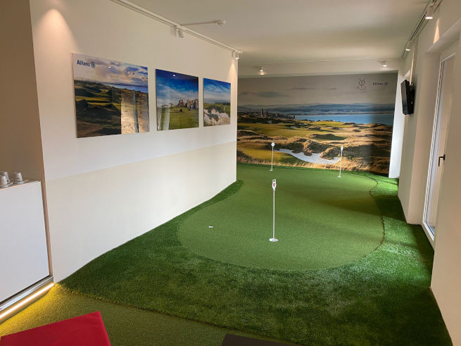 Austin indoor putting green in an office with scenic wall art
